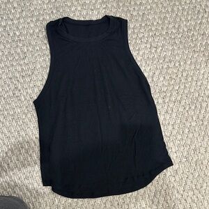 Black Racerback Lululemon Tank Top - Size 6
Slightly Sheet Fabric